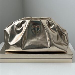 Clé de Peau Beauté Gold makeup cosmetic Bag